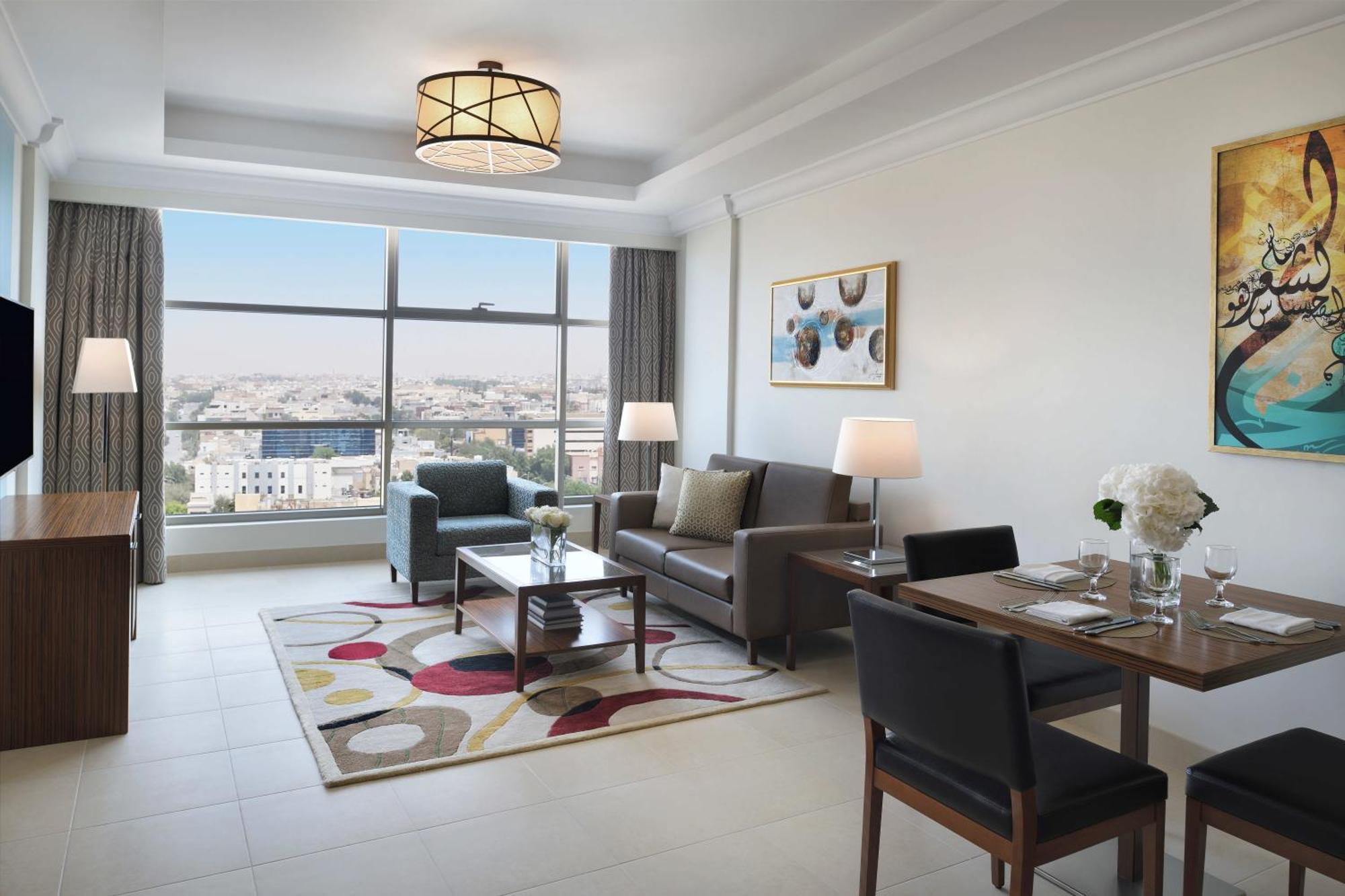 Marriott Executive Apartments Khobar Buitenkant foto A living room at the hotel